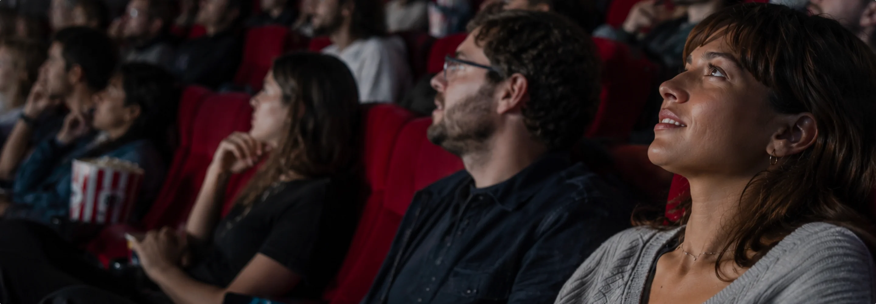 Audience watching a movie in a theater